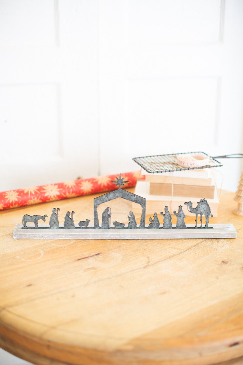 Metal Nativity on a Wooden Stand