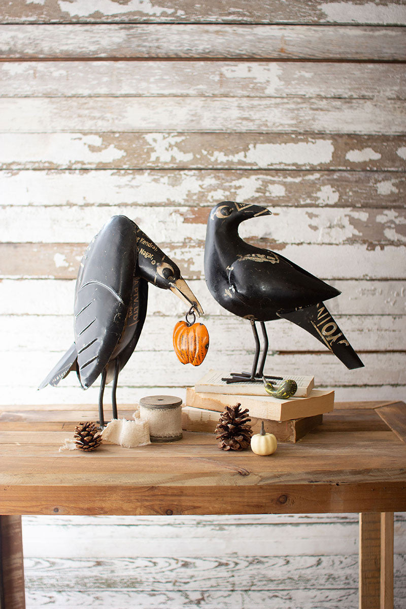 Set of 2 Recycled Iron Crows Holding a Pumpkin